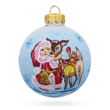 Whimsical Winter Duo: Girl and Reindeer Blown Glass Ball Christmas Ornament 3.25 Inches in Blue color, Round shape