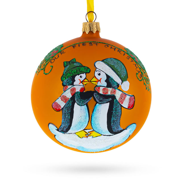 Glass Charming Penguin Couple Blown Glass Ball 'Our First Christmas' Ornament 4 Inches in Orange color Round