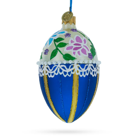 Glass Flowers on Beige and Blue Glass Egg Christmas Ornament 4 Inches in Blue color Oval