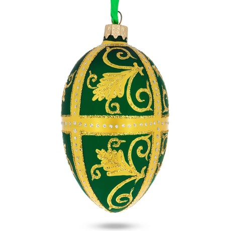 Glass Golden Leaves On Green Glass Egg Ornament 4 Inches in Green color Oval