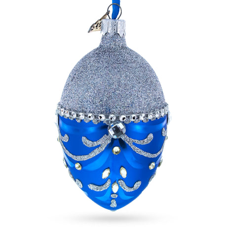 Glass Glittered Silver Top Blue Bottom Glass Egg Christmas Ornament 4 Inches in Blue color Oval