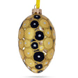 Glass Gold and Black Circles Glass Egg Christmas Ornament 4 Inches in Gold color Oval