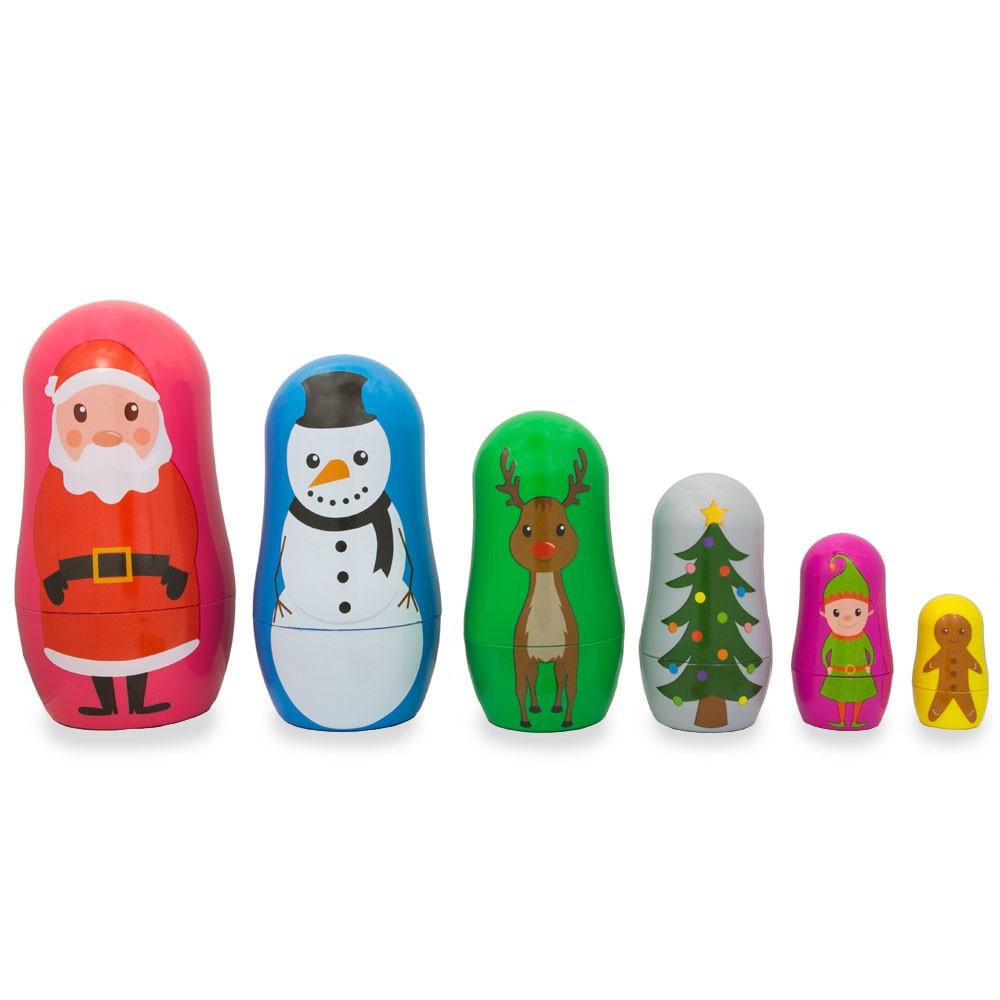 Plastic 6 Plastic Nesting Dolls - Santa, Snowman, Reindeer, Tree, Elf & Gingerbread in Multi color
