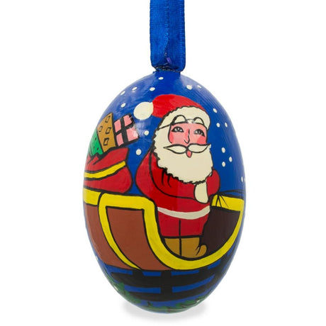 Wood Santa Riding Wooden Christmas Ornament in Multi color Oval