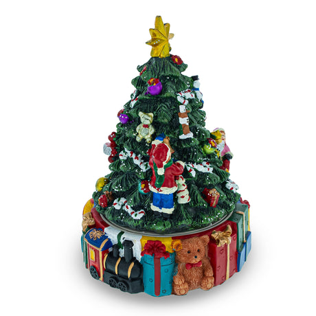 Gifts and Decorations Delight: Spinning Base Musical Figurine with Children Decorating Christmas Tree in Multi color, Triangle shape