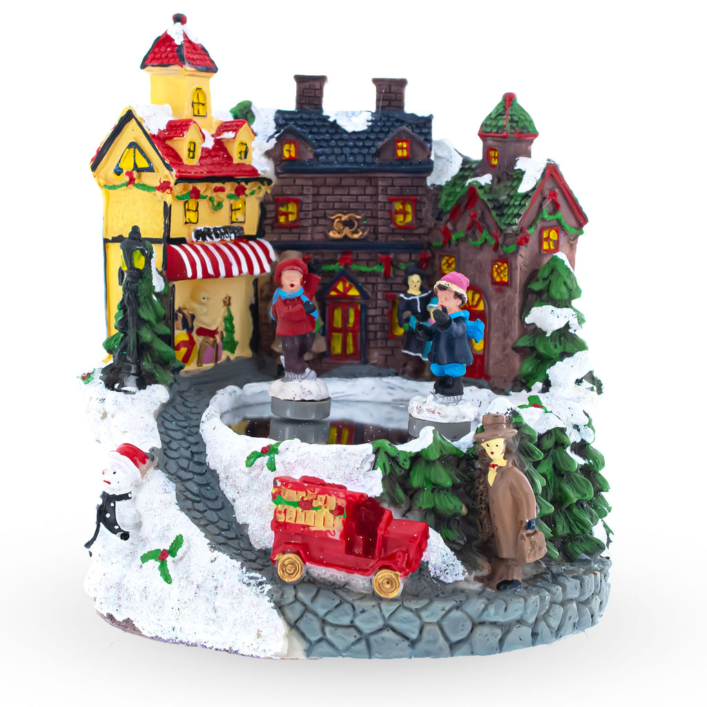 Resin Winter Village Whirl: Animated Musical Christmas Figurine of Children Skating in Multi color
