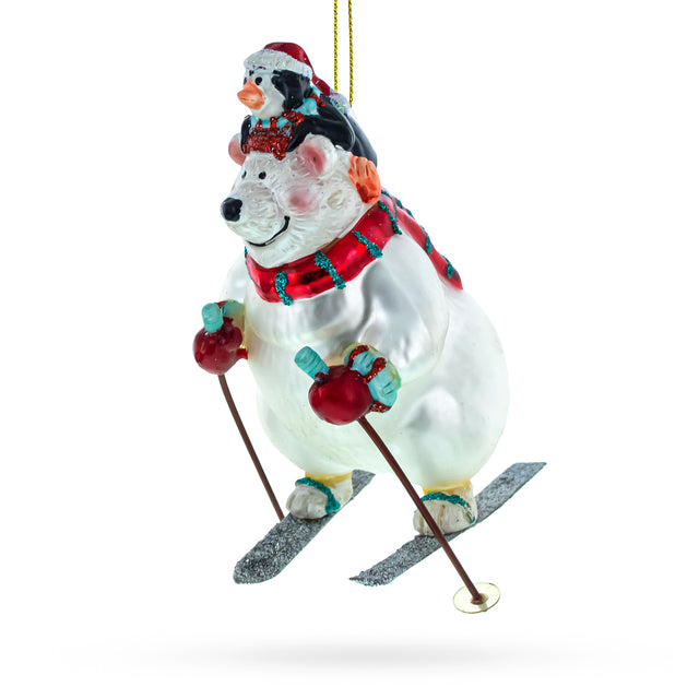 Adventurous Bear and Penguin Skiing - Blown Glass Christmas Ornament in White color,  shape