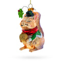 Squirrel Cradling an Acorn Glass Christmas Ornament in Brown color Figurine