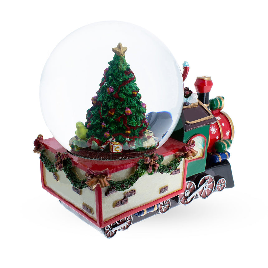 Children Riding Train Musical Water Snow Globe , dimensions in inches: 8.3 x 7 x 4.6