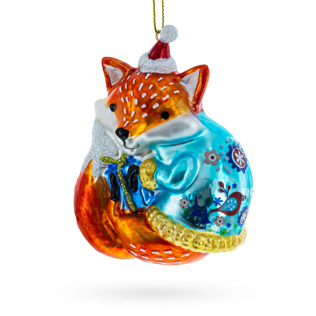 Festive Forest Friend: Whimsical Fox with Gifts - Blown Glass Christmas Ornament in Multi color,  shape
