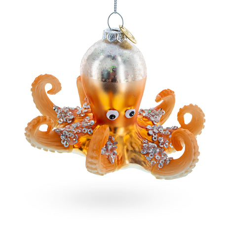 Glass Ocean's Enigma: Octopus - Blown Glass Christmas Ornament in Orange color