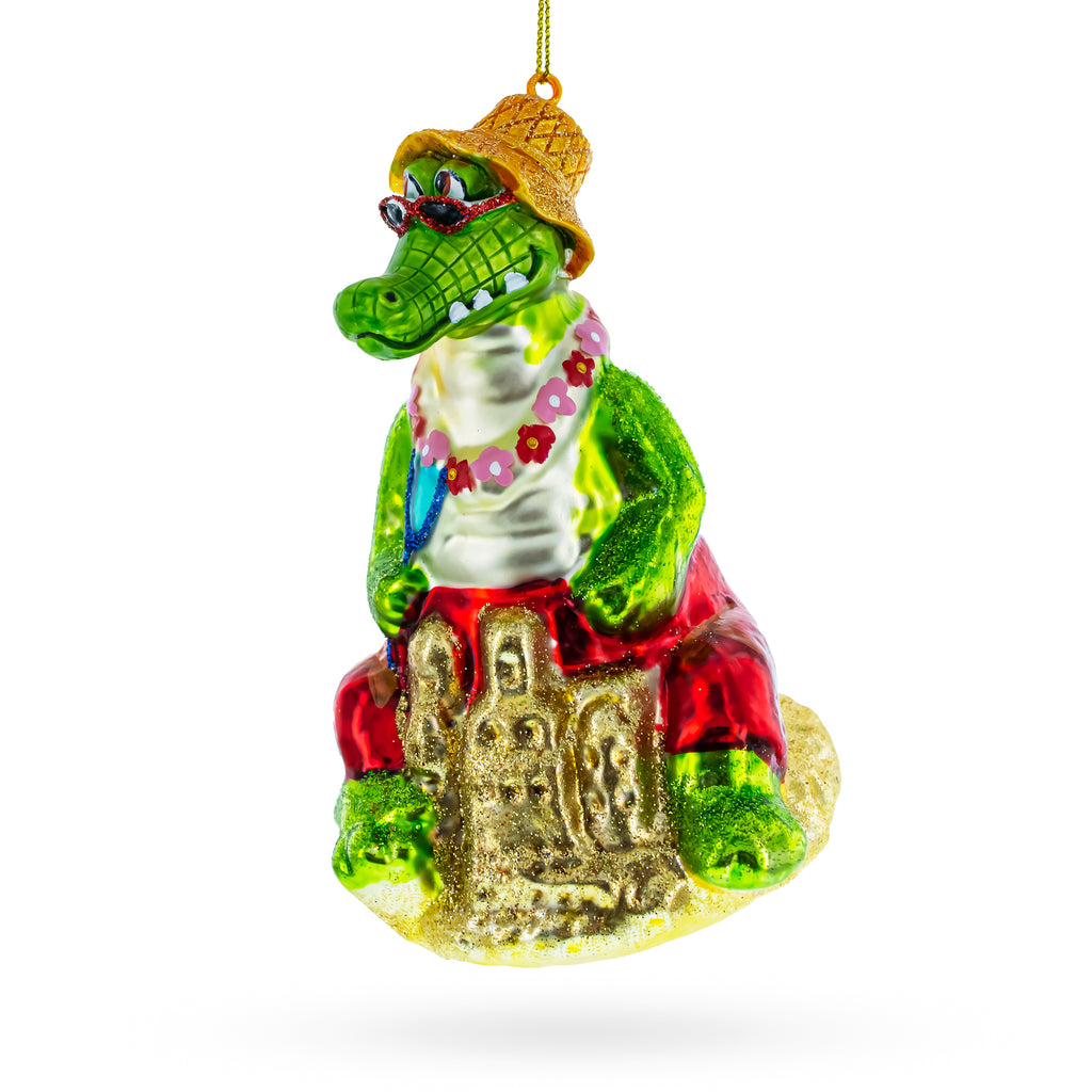 Alligator Relaxing on the Beach Glass Christmas Ornament in Green color Figurine