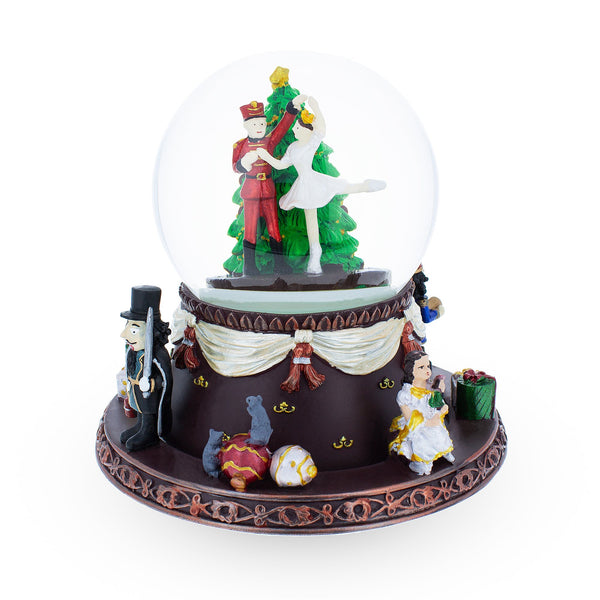 Enchanted Nutcracker Ballet: Spinning Musical Water Snow Globe with Clara in Brown color, Round shape