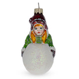 Glass Girl Making a Snowball Glass Christmas Ornament in Multi color