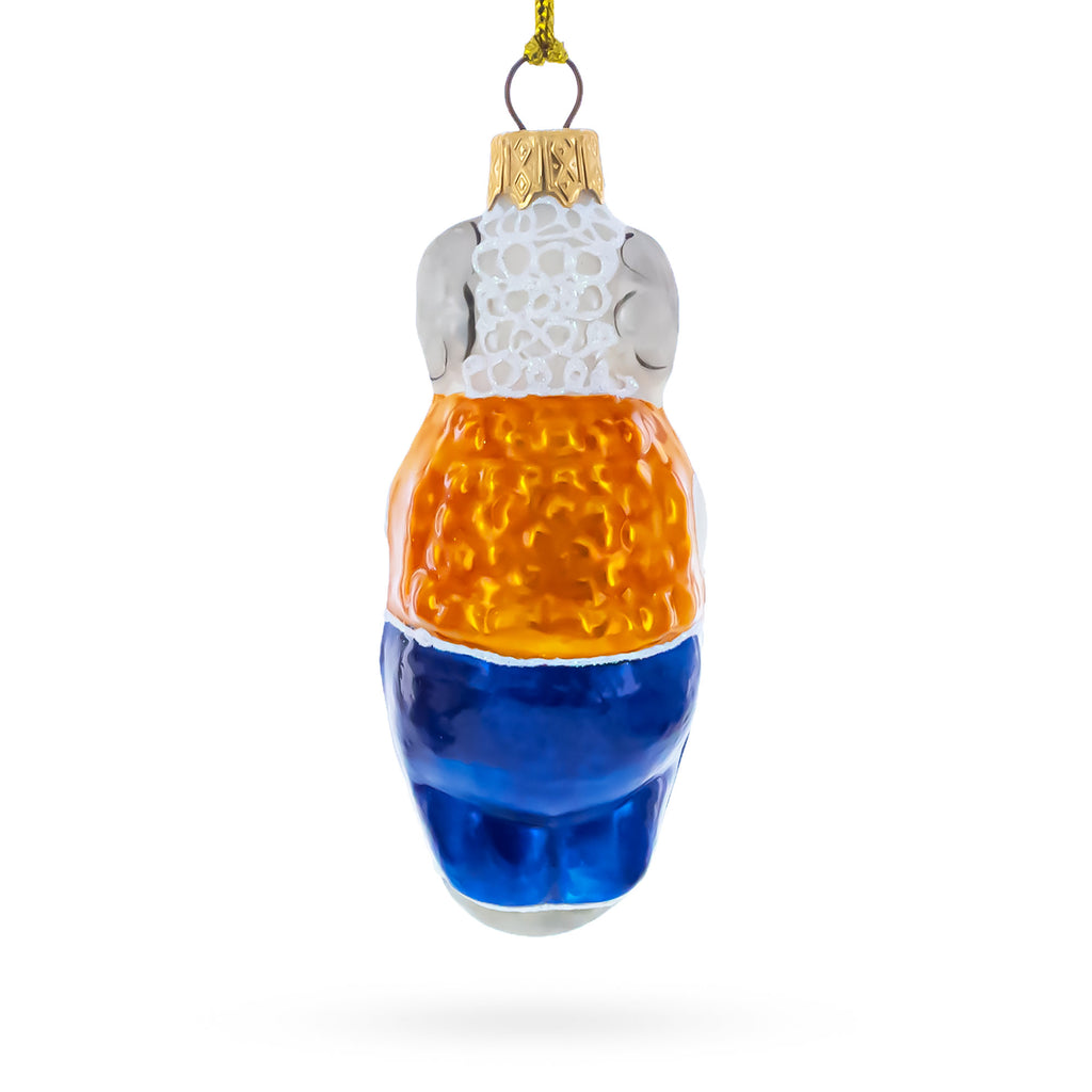 Goat in Folk Vest with Blue Trousers and Hat Glass Christmas OrnamentUkraine , dimensions in inches: 4.1 x 1.5 x 1.5