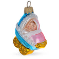 Newborn Baby Girl in a Stroller Glass Christmas Ornament in Blue color Figurine