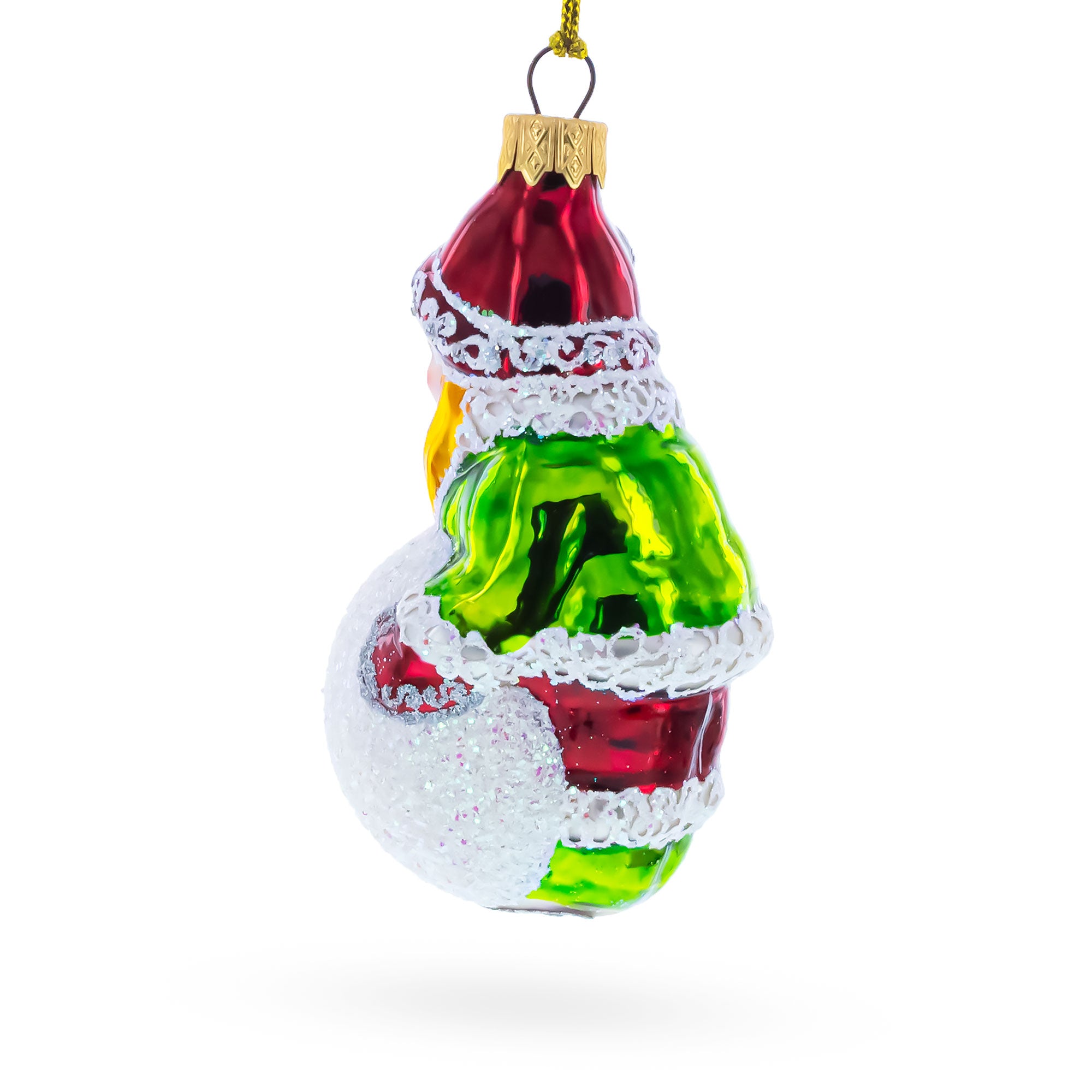 Girl Making a Snowball Glass Christmas OrnamentUkraine , dimensions in inches: 4.5 x 2.2 x 2.2