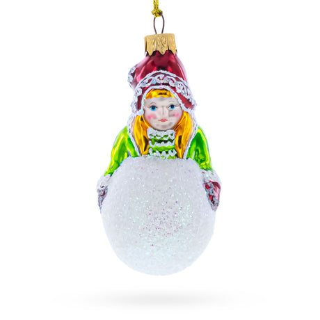 Girl Making a Snowball Glass Christmas Ornament in Multi color
