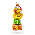 Yellow Duck on Letter Blocks Glass Christmas Ornament in Yellow color