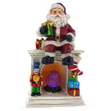 Santa Sitting on a Fireplace LED Lights Figurine 7.75 Inches in Red color