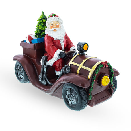 Santa Driving Classic Car with LED Lights Figurine 10.5 Inches Long in Red color