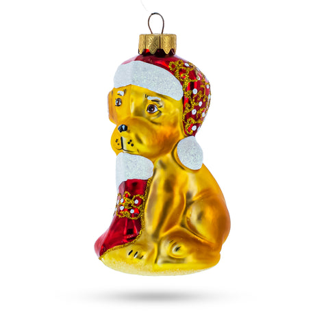 Dog Holding Stocking Glass Christmas Ornament in  color