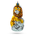 Lion Sitting on The Rock Glass Christmas Ornament in Yellow color,  shape