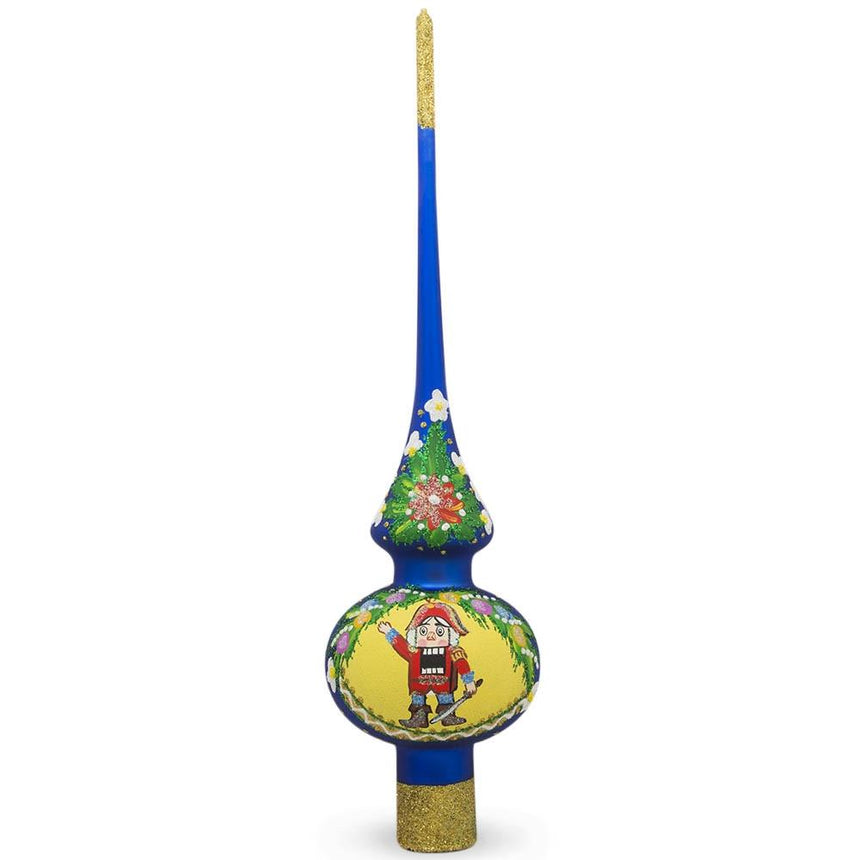 Nutcracker and Wreath on Blue Mouth Blown Glass Christmas Tree Topper 11 Inches in Blue color Triangle