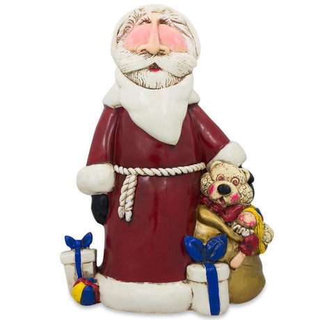 Santa with Gifts Resin Figurine 7.5 Inches in Multi color,  shape