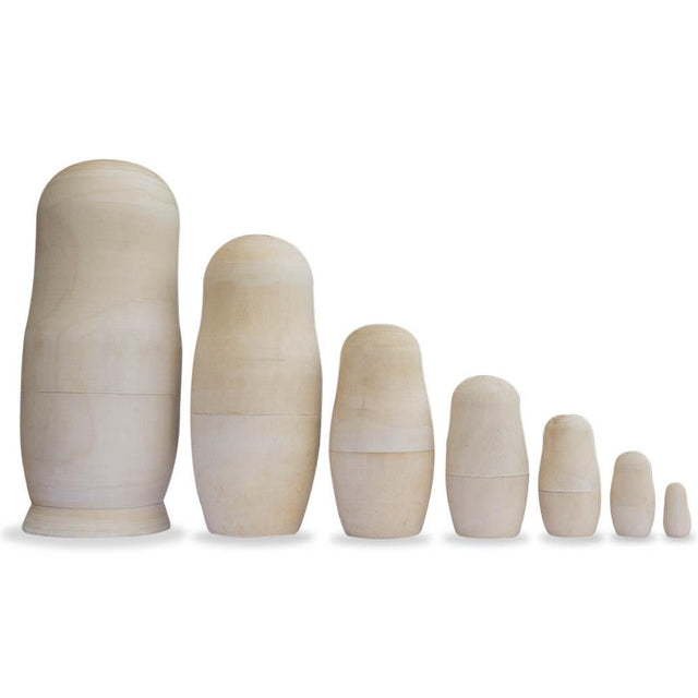 Set of 7 Unpainted Blank Wooden Nesting Dolls 6.75 Inches in beige color,  shape