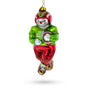 Athletic Snowman Playing Football - Captivating Blown Glass Christmas Ornament in Red color,  shape