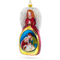 Guardian Angel over Nativity Glass Christmas Ornament in Red color Figurine