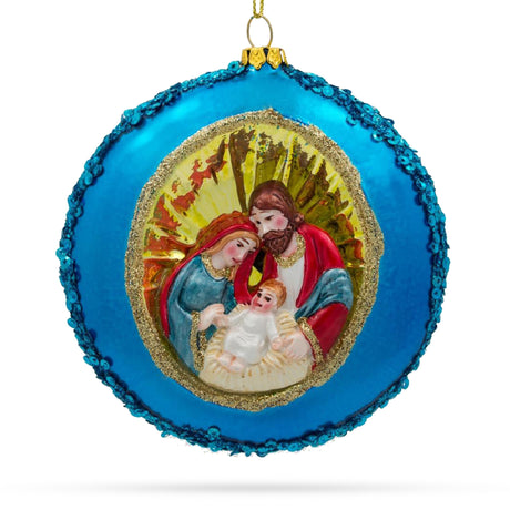 Serene Holy Family on Purple Disc - Blown Glass Christmas Ornament in Blue color, Round shape