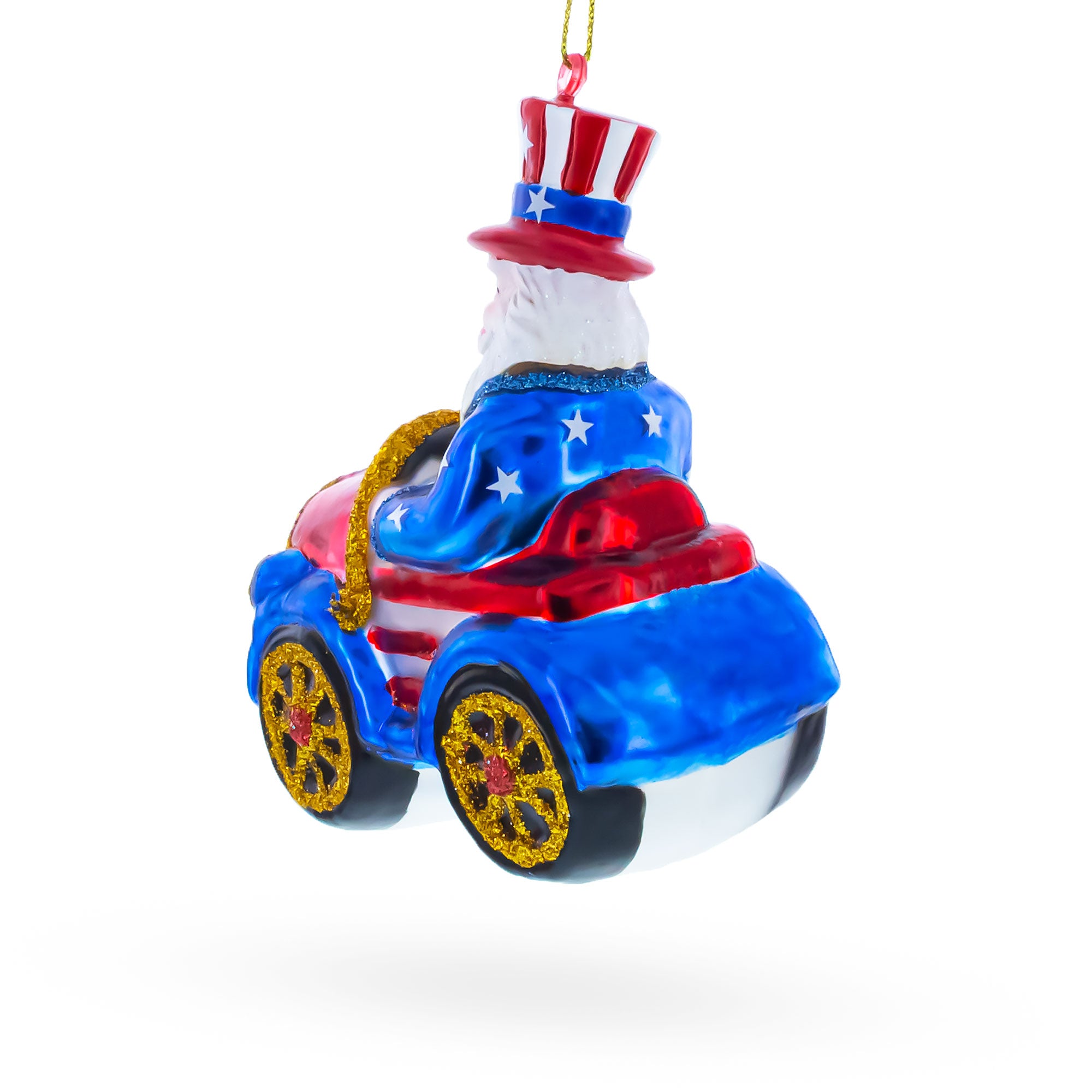Uncle Sam Santa Driving a Car Blown Glass Christmas OrnamentChina , dimensions in inches: 4 x 3.25 x