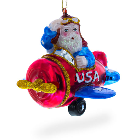Adventurous Pilot Santa in Airplane - Blown Glass Christmas Ornament in Multi color,  shape