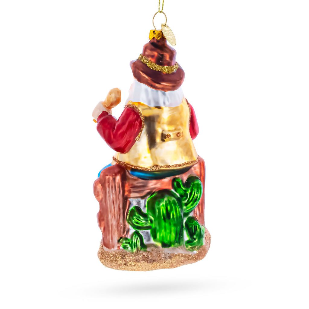 Cowboy Santa with Drink and Drumstick Glass Christmas OrnamentChina , dimensions in inches: 5.4 x 2.8 x