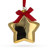 Radiant Golden Star Adorned with Red Bow - Blown Glass Christmas Ornament in Gold color, Star shape