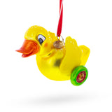Yellow Duck Rolling on Wheels Blown Glass Christmas Ornament in Yellow color