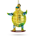 Turtle Surfing Glass Christmas Ornament in Yellow color Figurine