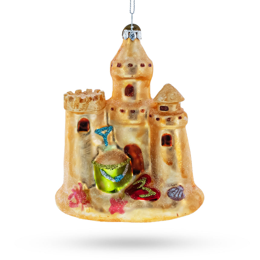 Beachy Sand Castle Blown Glass Christmas Ornament in  color