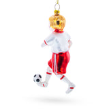 Sporty Girl Playing Soccer Blown Glass Christmas Ornament , dimensions in inches: 5 x 1.9 x 1.3