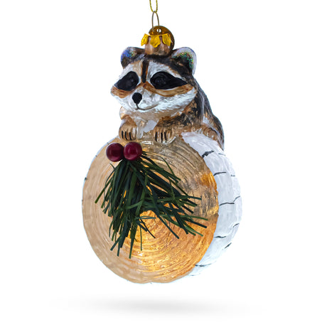 Curious Raccoon on the Log Blown Glass Christmas Ornament in Multi color