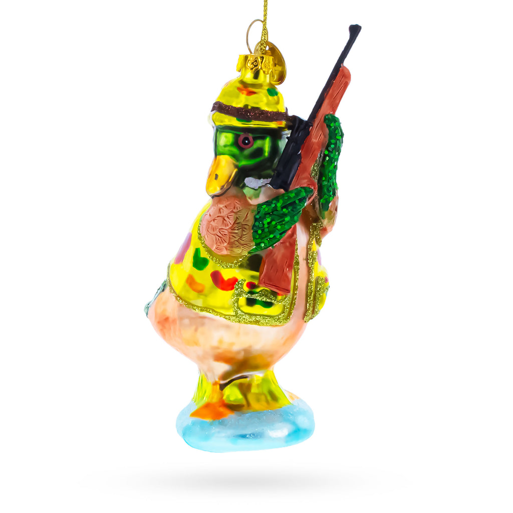 Duck the Hunter Glass Christmas Ornament in Yellow color Figurine