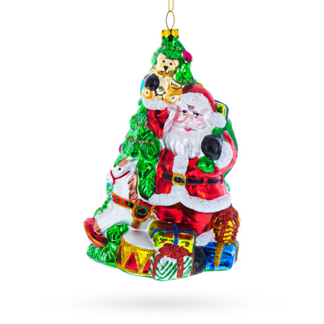 Jolly Santa by Tree Blown Glass Christmas Ornament in Multi color Triangle
