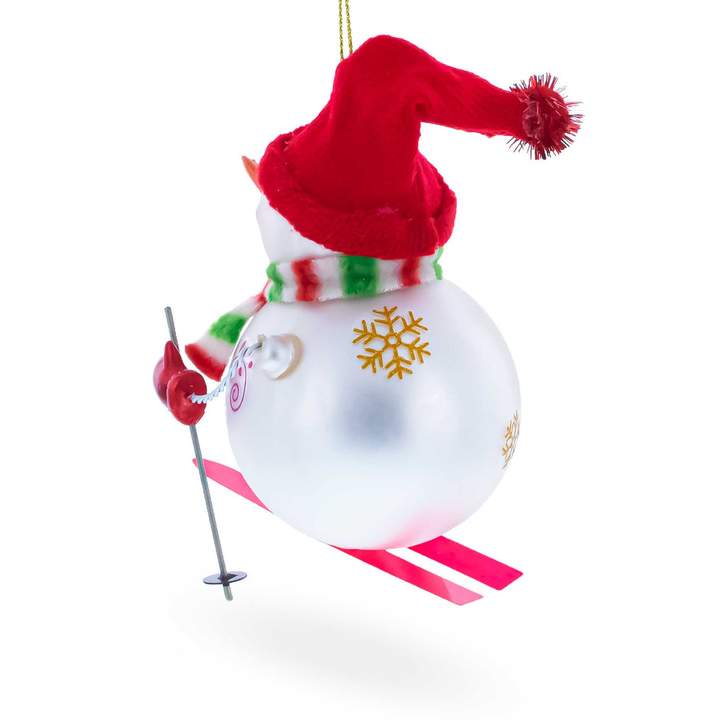 Snowman Skiing Glass Christmas OrnamentChina , dimensions in inches: 4.9 x 4.1 x 4.1