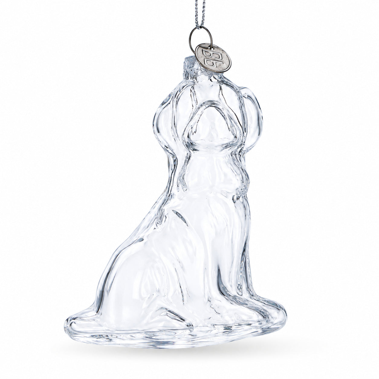 Dog with Festive Bow Clear Glass Christmas OrnamentChina , dimensions in inches: 3.9 x 2.8 x 1.7