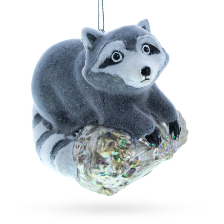 Glass Playful Raccoon on a Log - Blown Glass Christmas Ornament in Gray color