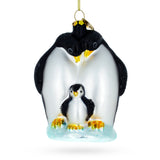Tender Penguins with Baby Chick Glass Christmas Ornament in Multi color