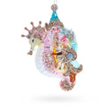 Santa Riding Seahorse Glass Christmas Ornament in Pink color Figurine