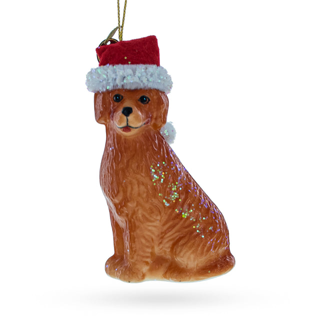 Golden Retriever in a Santa Hat Glass Christmas Ornament in Gold color